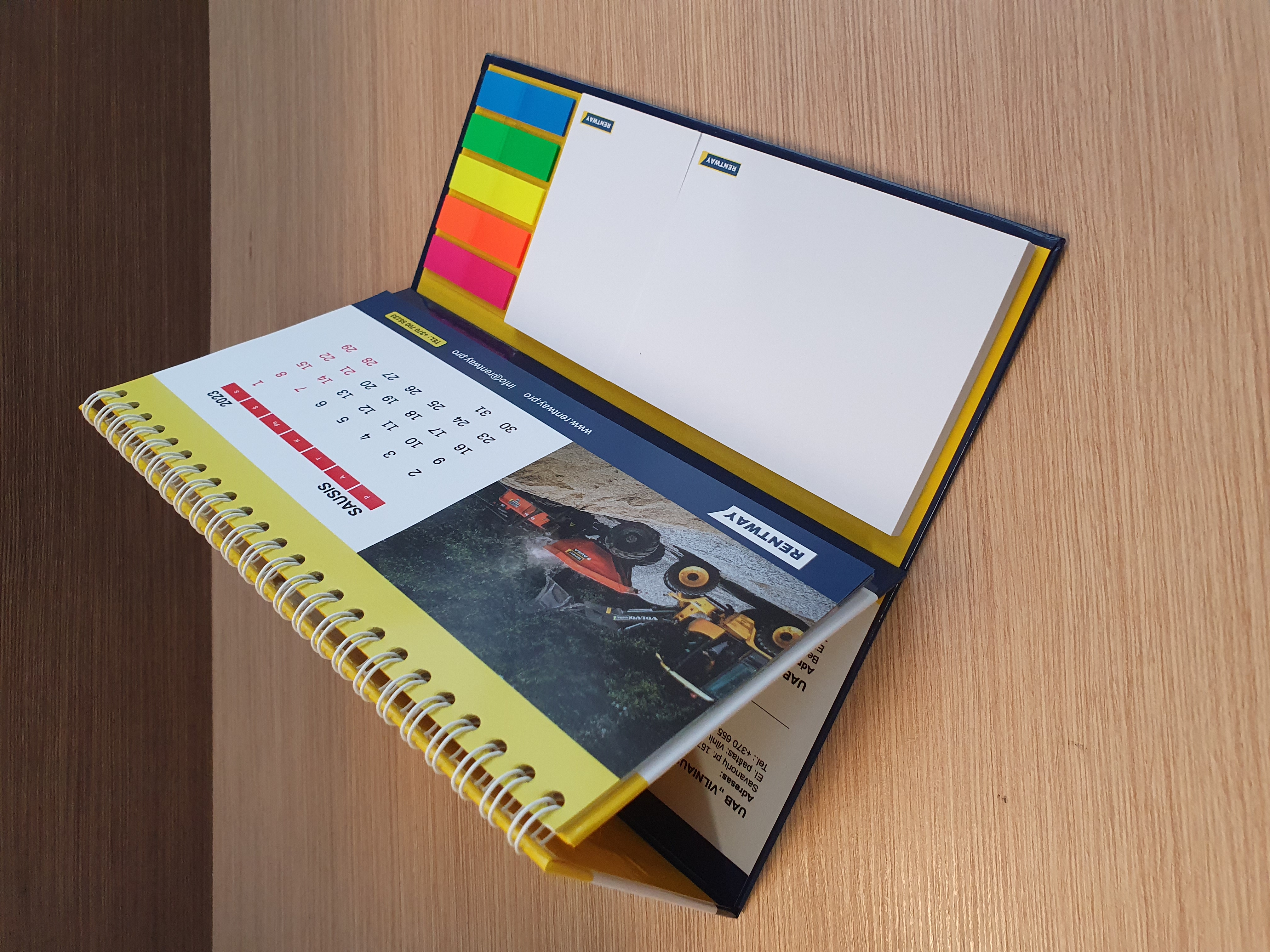 Hard cover calendar with adhesive note pads