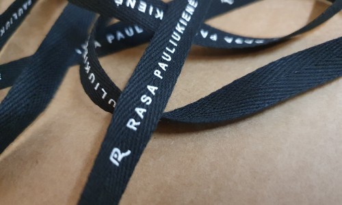 Decorating stain label tape with embossing