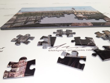 Delionės Puzzle su reklama