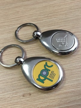 Pakabukai su žetonu pirkinių vežimėliui