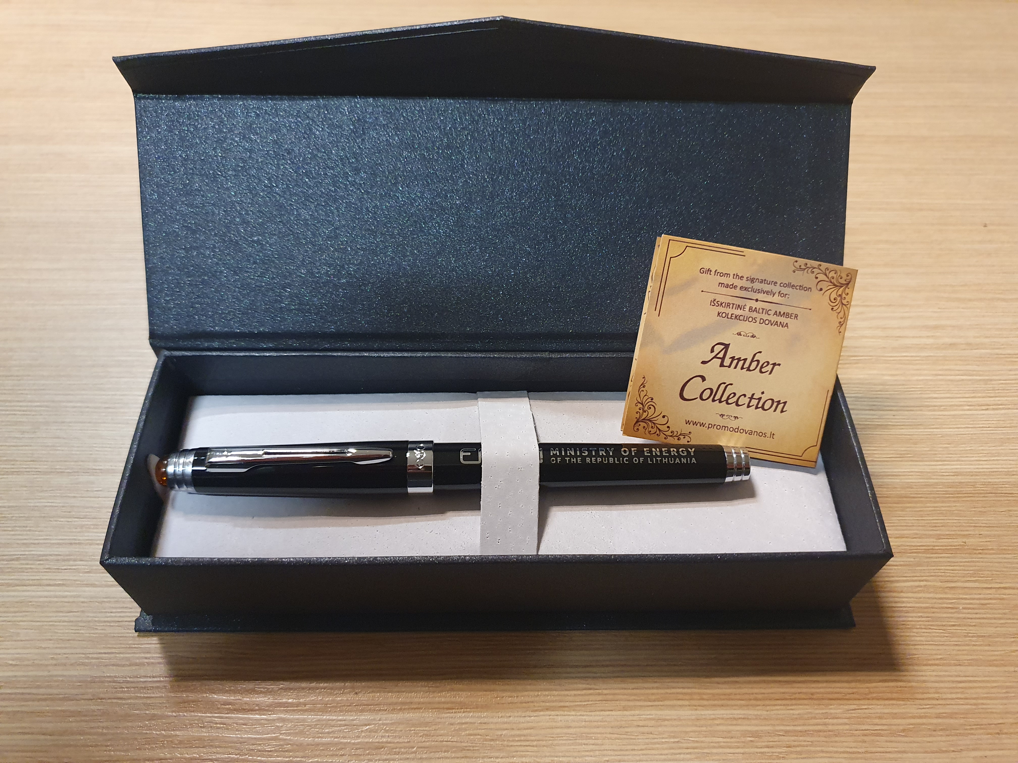 Pen with amber